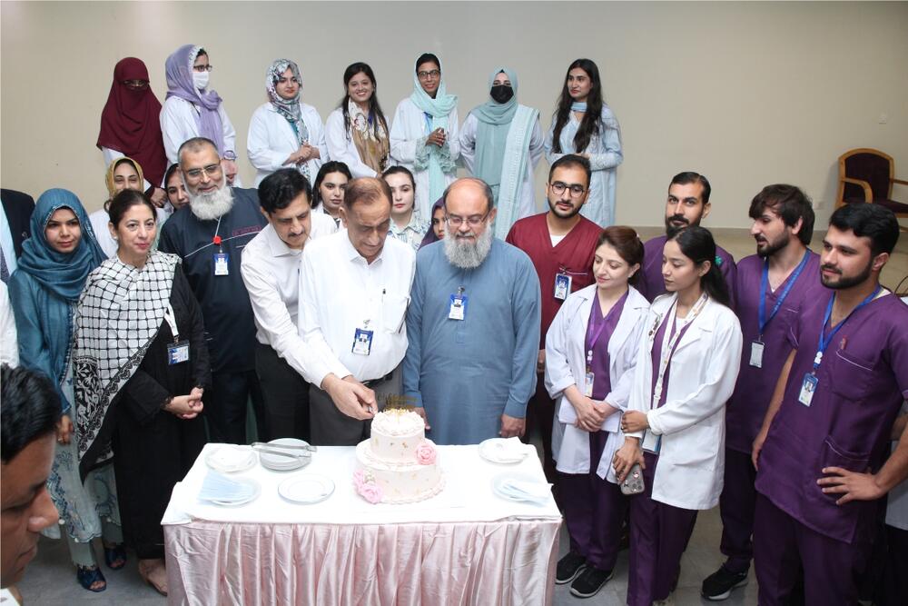 Shifa International Hospital team celebrates 600 successful bone marrow transplants with cake-cutting and smiles