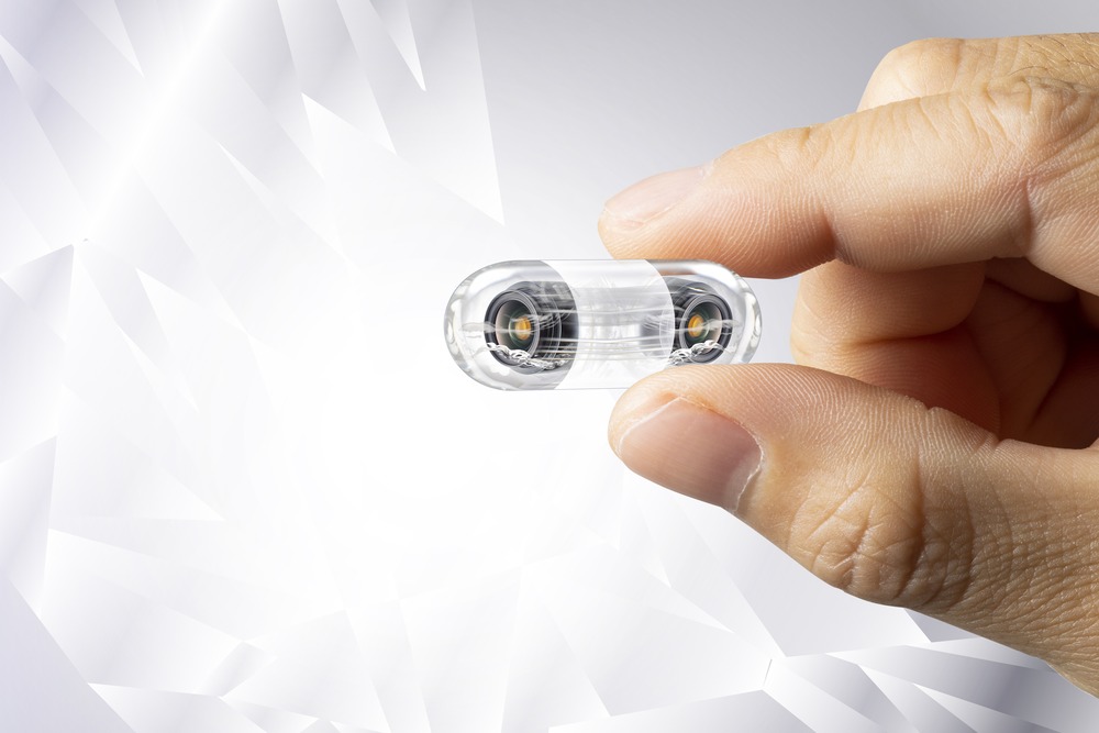 Capsule endoscopy device, a small vitamin-sized camera capsule held in hand for digestive tract examination