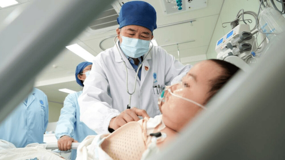 A baby receiving medical treatment in a Chinese hospital, highlighting China’s advanced healthcare and disease control system