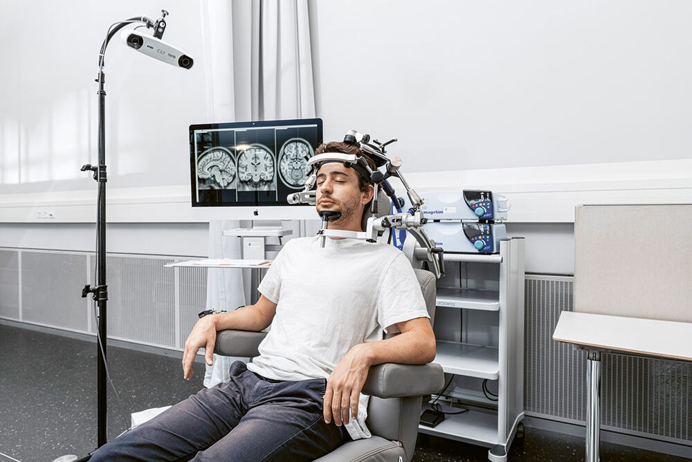 A man undergoing deep brain stimulation surgery