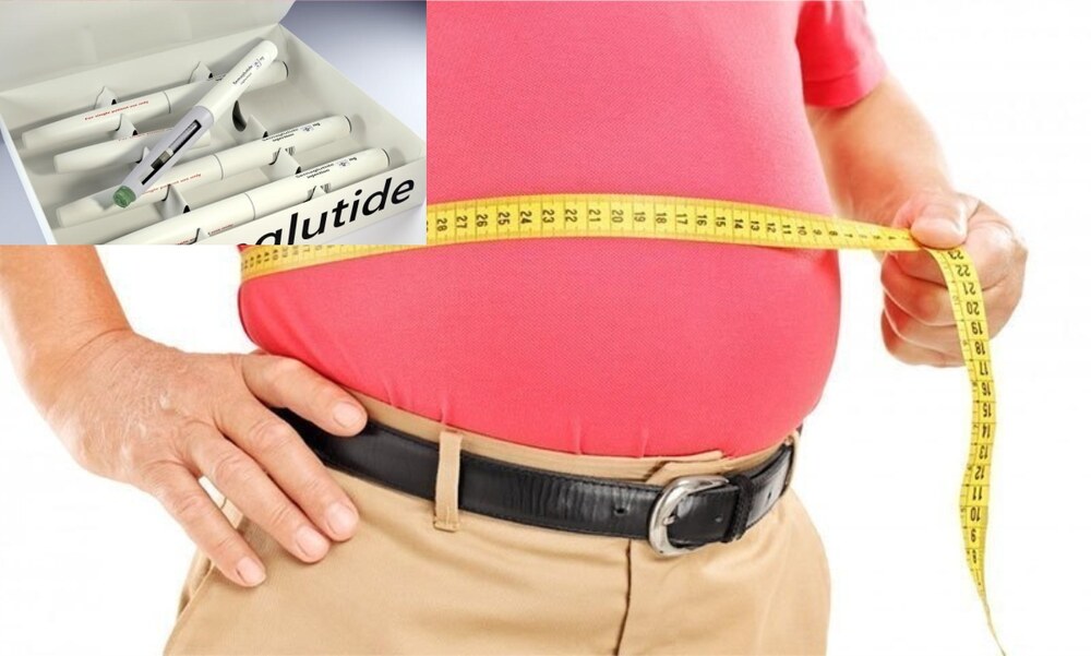 Overweight man measuring his waist