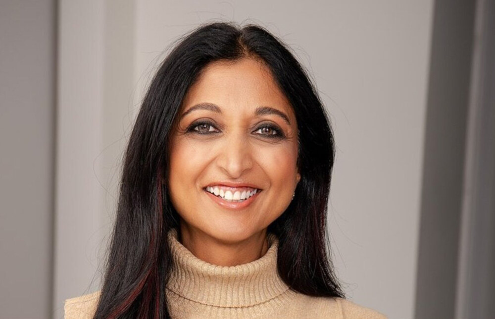 Dr Alka Patel, 53-year-old longevity and lifestyle medicine expert, smiling and demonstrating healthy lifestyle habits