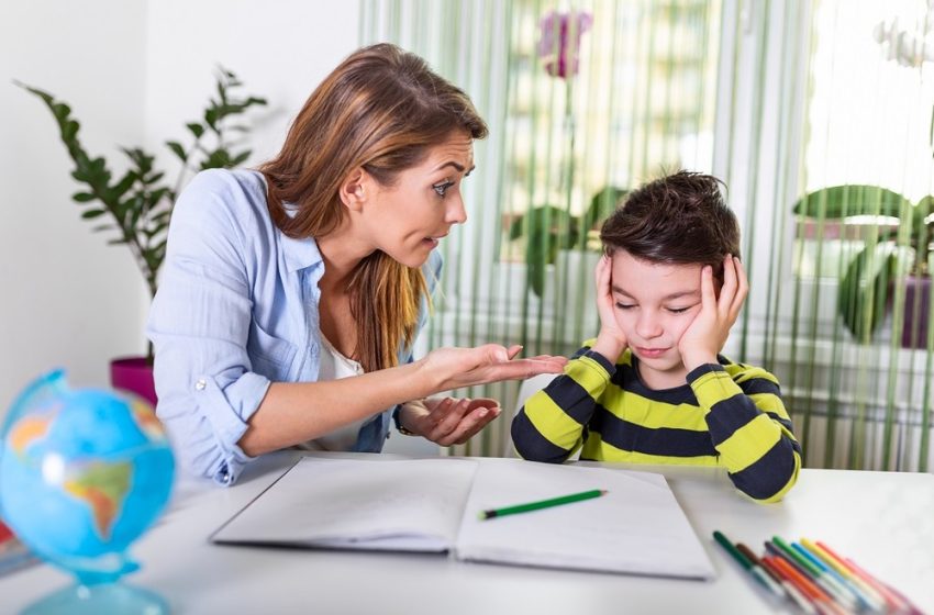 A mother is asking her ADHD child to pay attention to the studies