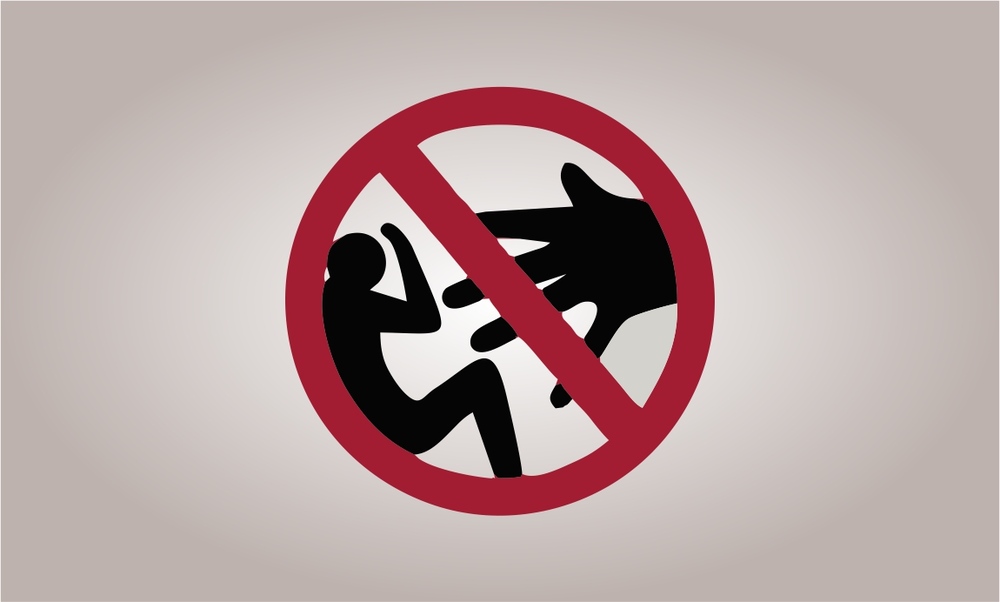 Awareness signboard against sexual violence, highlighting support services for victims and safety resources.