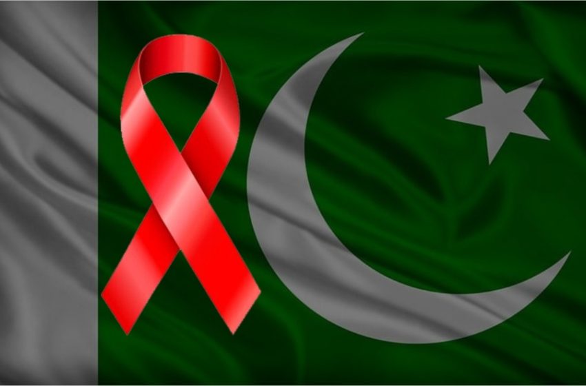 AIDS red ribbon with Pakistani flag in background representing HIV awareness in Pakistan