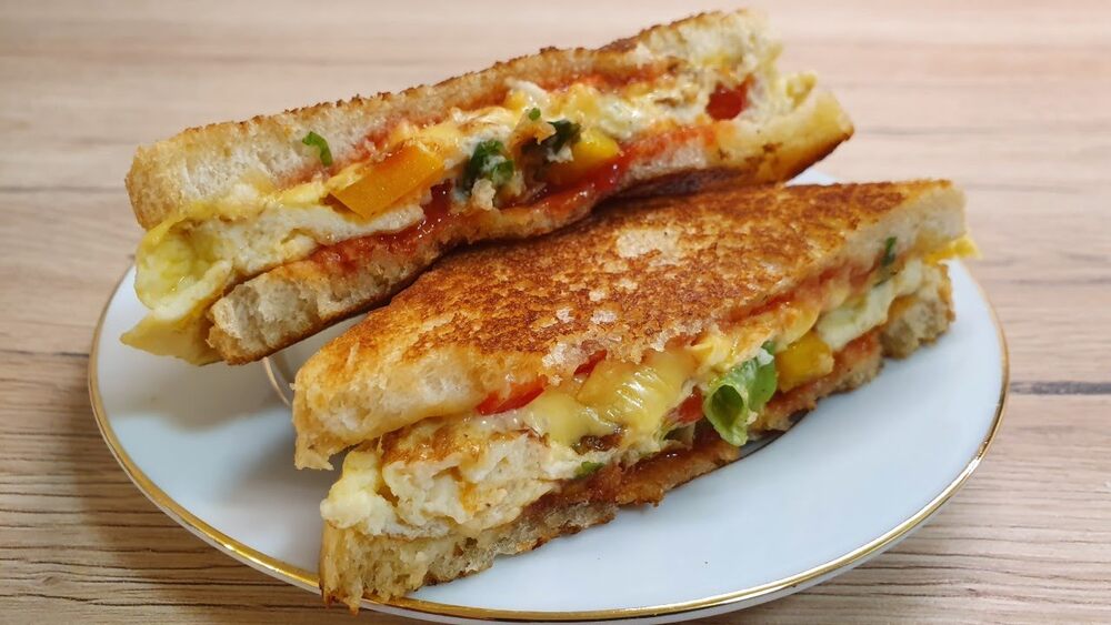 Healthy daily bread omelette with eggs, vegetables, and whole-grain bread served for breakfast