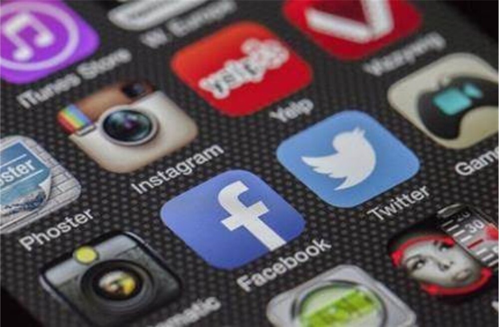 A mobile phone screen showing icons of different social media platforms