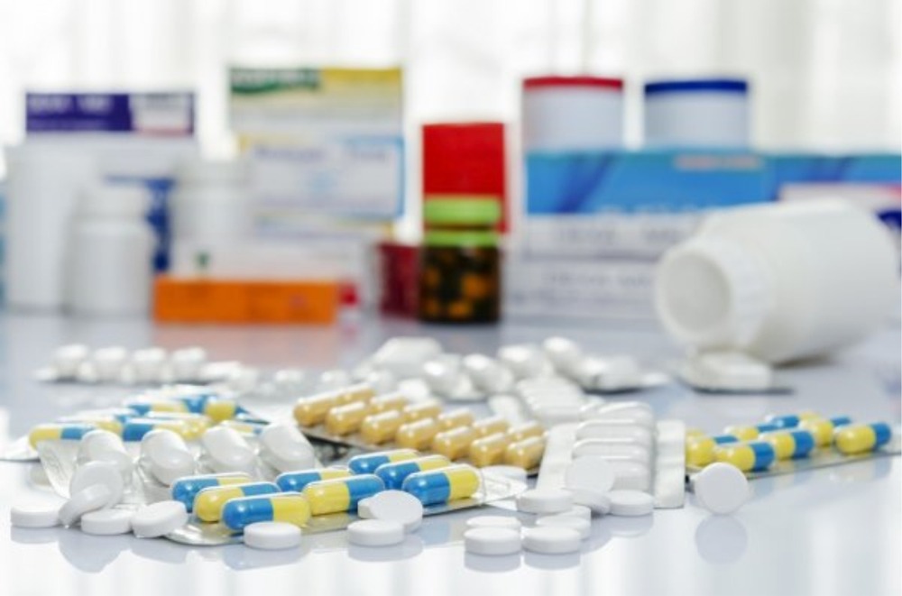 Assorted medicines neatly arranged on pharmacy shelves, highlighting improved drug availability in Pakistan