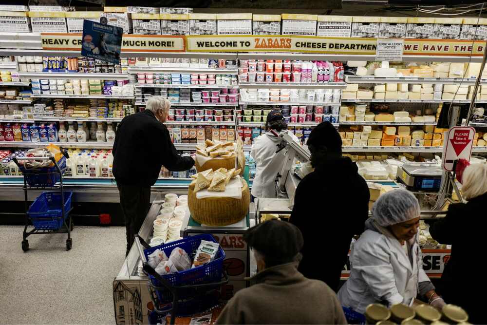 Grocery store aisle with fresh fruits, vegetables, high-protein snacks, and healthy food options for weight-conscious shoppers