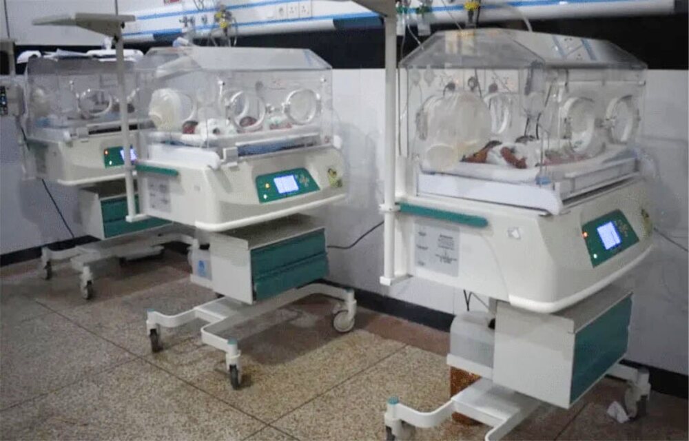 Representative image of premature newborns receiving medical care in neonatal intensive care unit