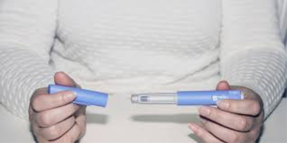 Close-up of an Ozempic injection pen for diabetes and weight-loss treatment.