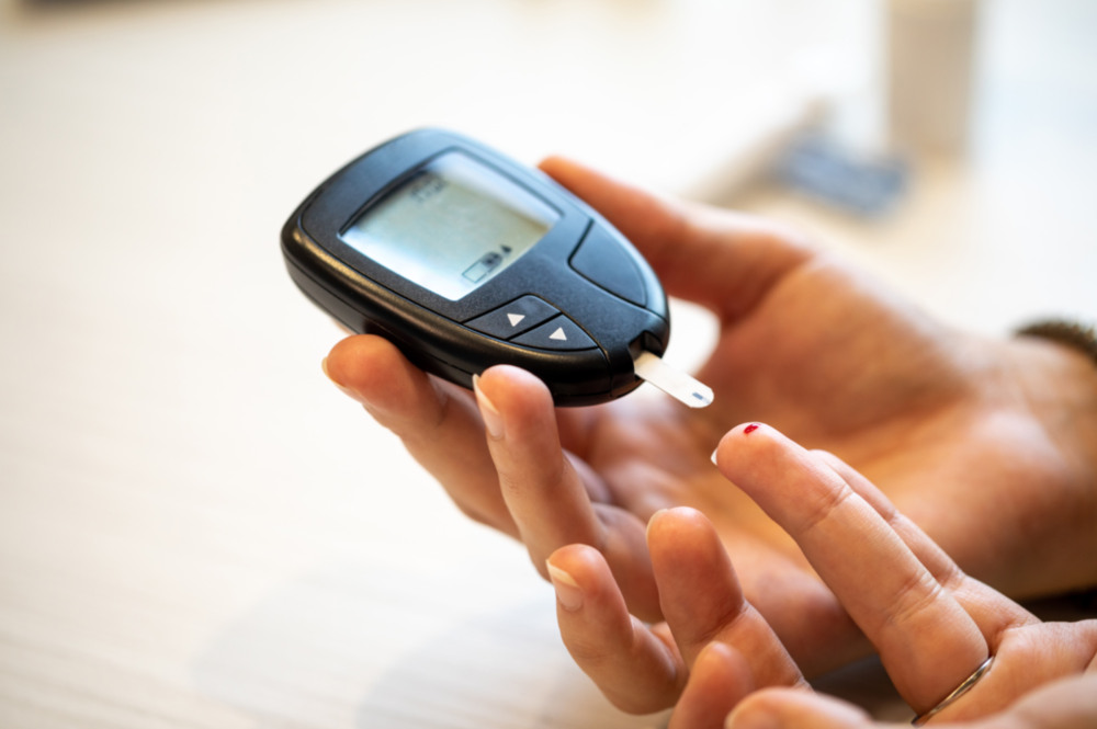 A Type 2 Diabetic person is monitoring his sugar level with the help of a glucose meter