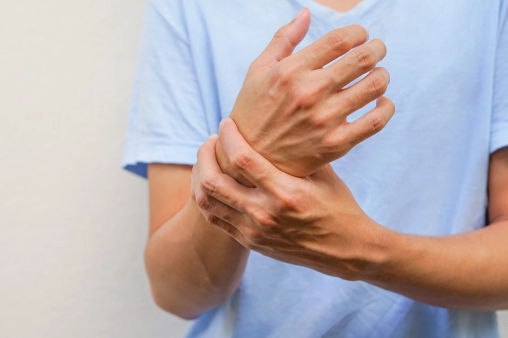 Wrist pain symptoms, wrist injury, diagnosis, treatment, and hand health illustration